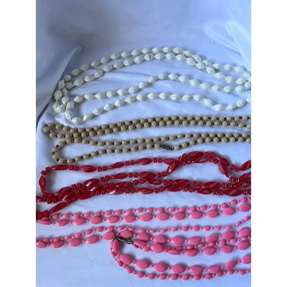 Lot of 4 plastic 1970's Vintage Long Necklaces